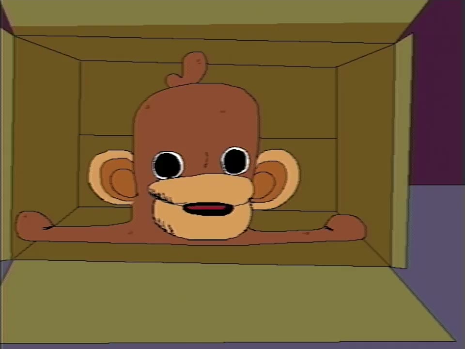 Onkey in the box with his mouth open, mid-ooh.